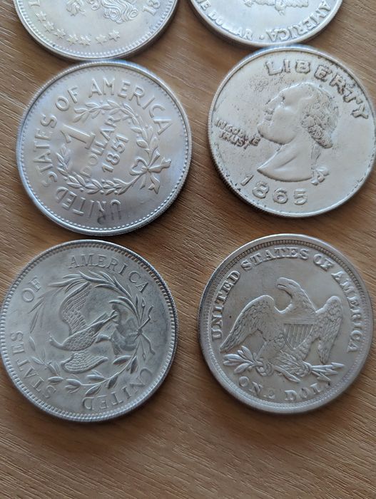 Монети one dollar