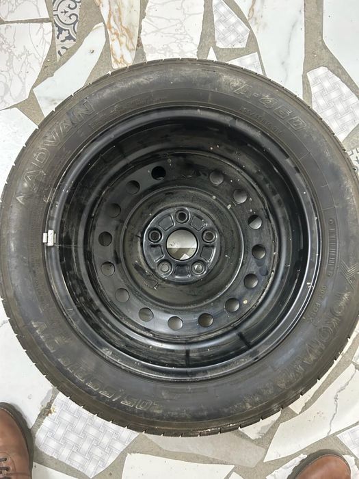 автошина новая от тойота каролла