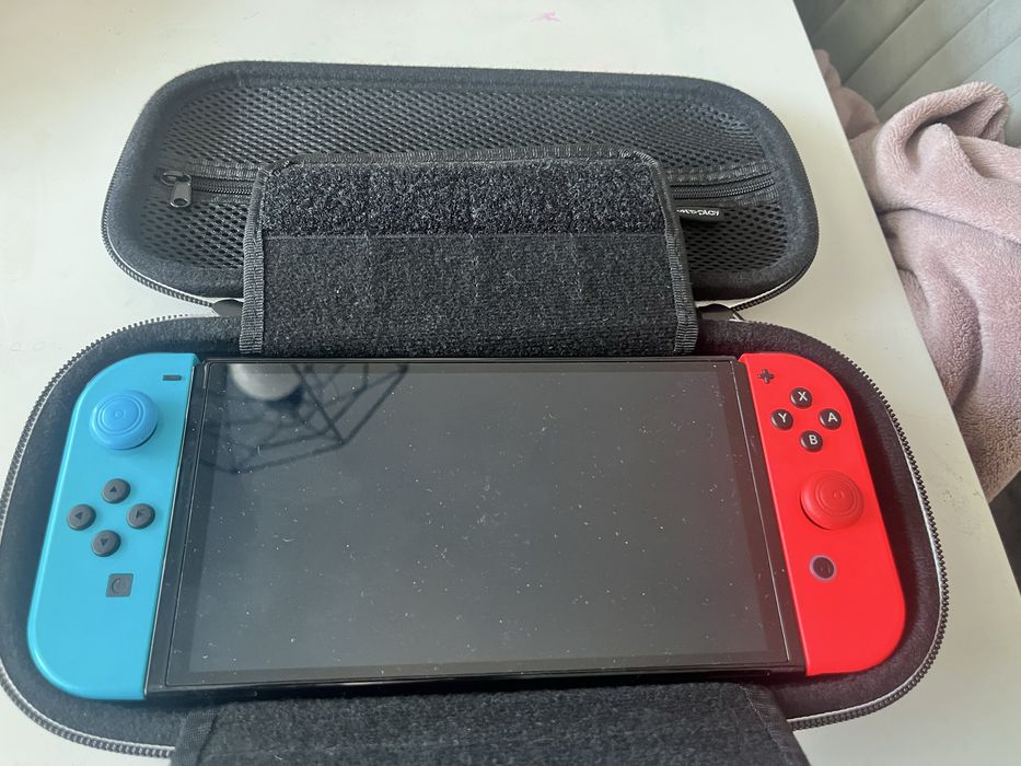Vand nintendo switch oled+joc+accesorii