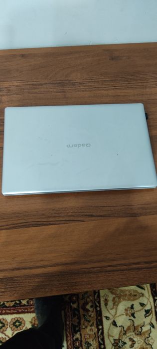 Ноутбук . Qadam .