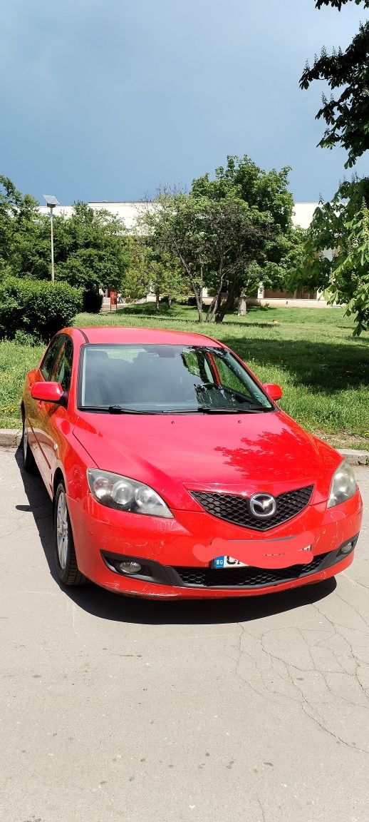 Автомобил Мазда 3