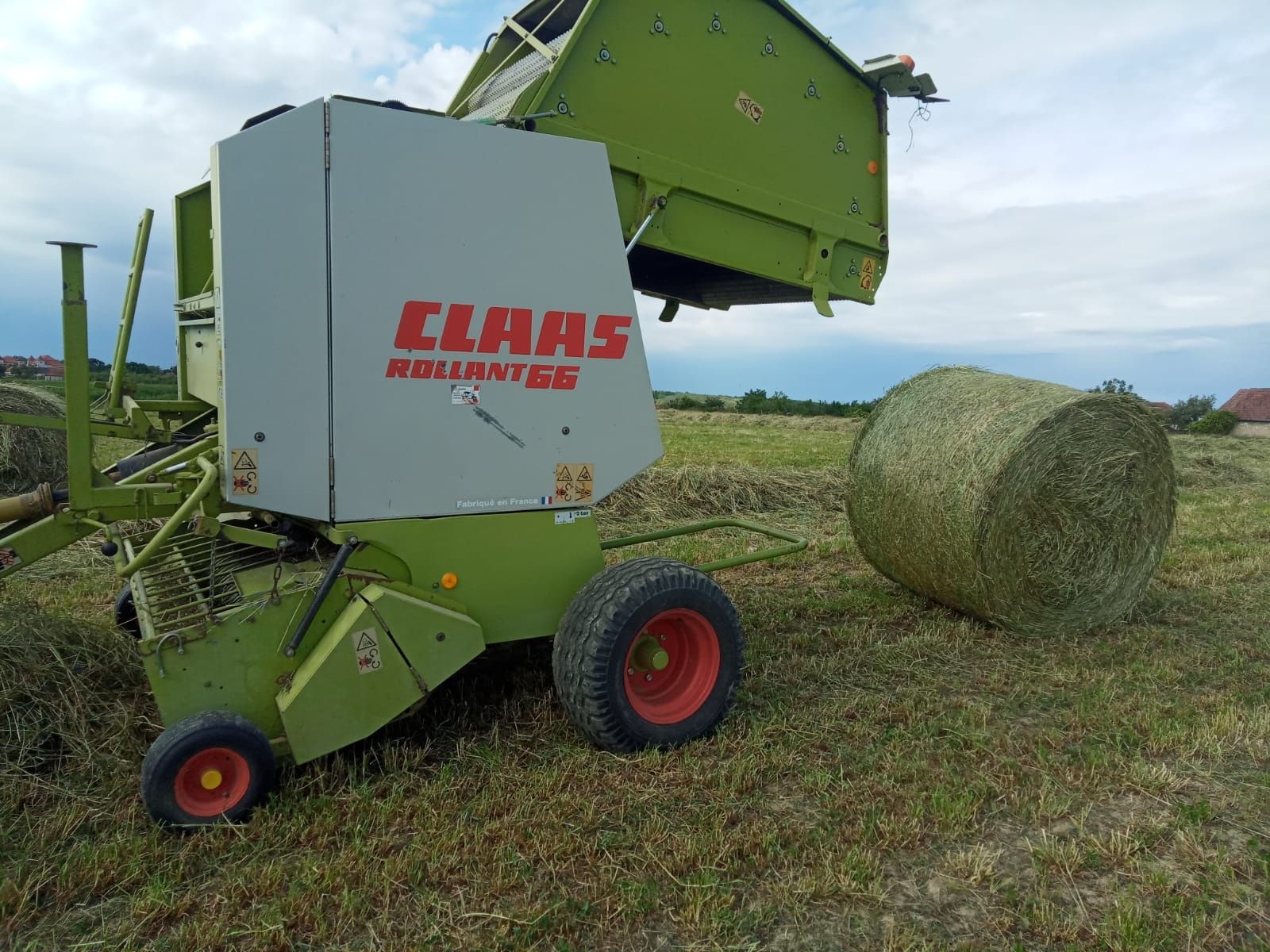 Presa baloti rotunzi Claas Rollant 66 plasa Krone