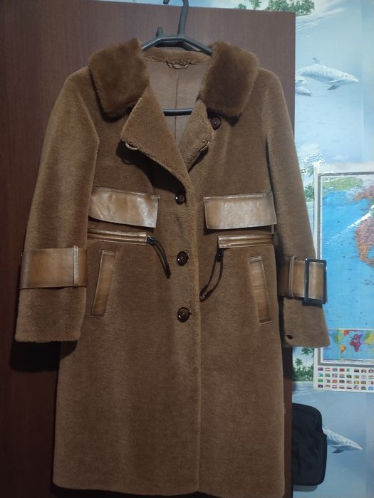 Продам дублёнку с шапкой 100.000