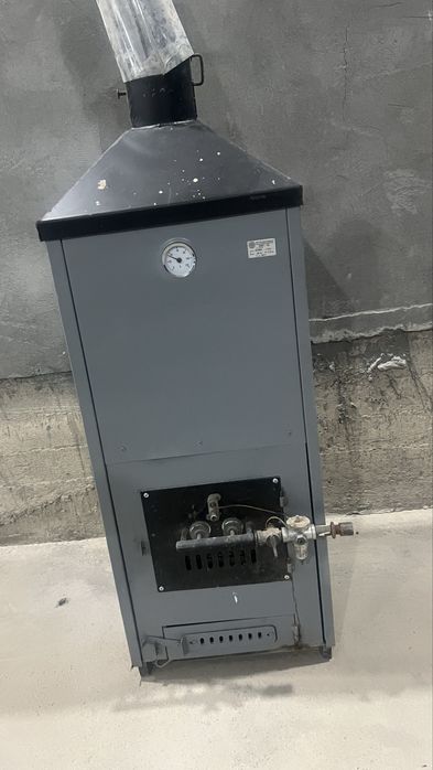 Уйни иситиш учун котёл котеджники янги