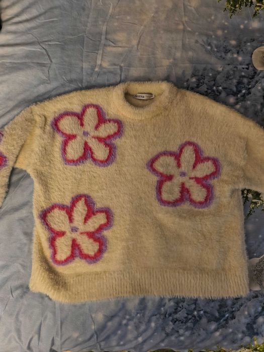 Зимни пуловери в различни цветове