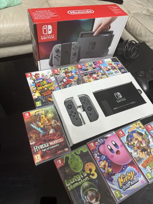 Pachet nintendo switch + 9 jocuri + 2 controlere in stare excelenta