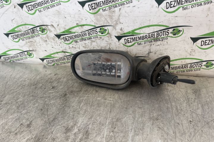 Oglinda stanga manuala E20103017 / E2 0103017 Dacia Logan prima gener