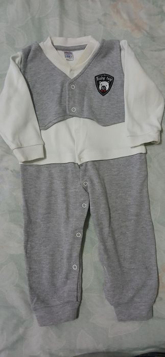 Продам тёплые комбинезон для новорождённого