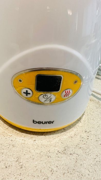 Уред за затопляне на бебешки шишета и бурканчета