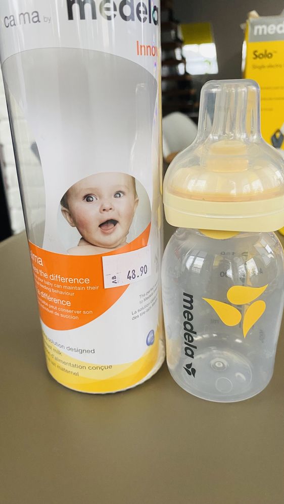 Medela Solo двуфазна ел. помпа + шише Calma + пликове