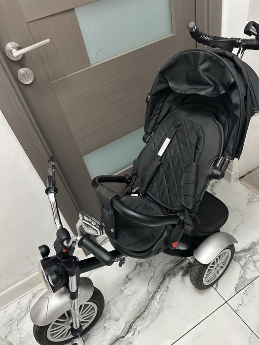 Vand tricicleta cu scaun reversibil Still 6-36 luni , cu pozitie somn