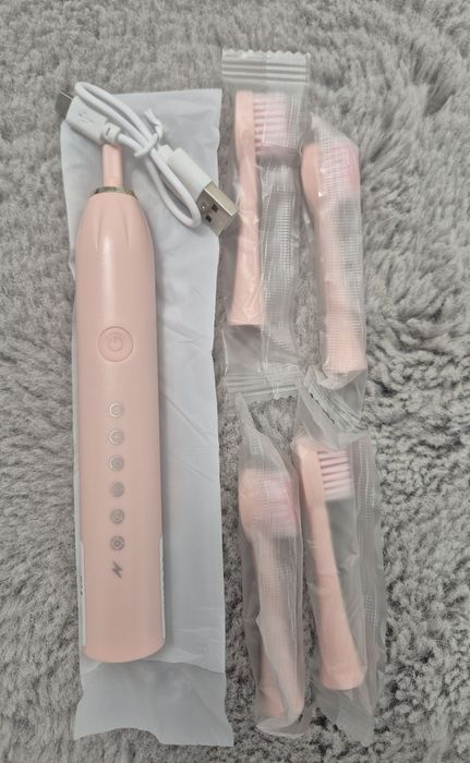 Periuta de dinți electrică roz cu 4 capete de schimbare