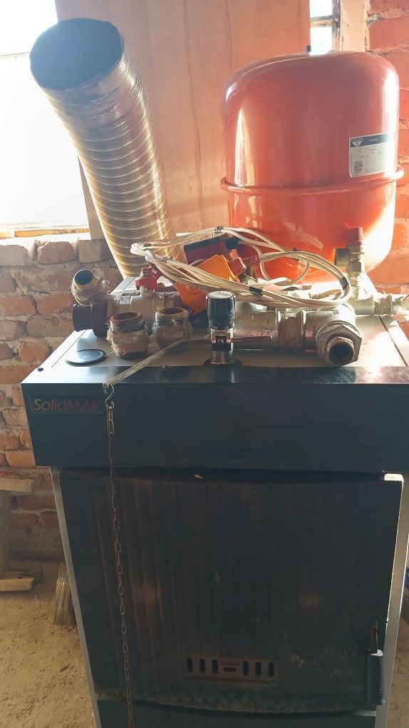 Чугунен котел на твърдо гориво SolidMAX