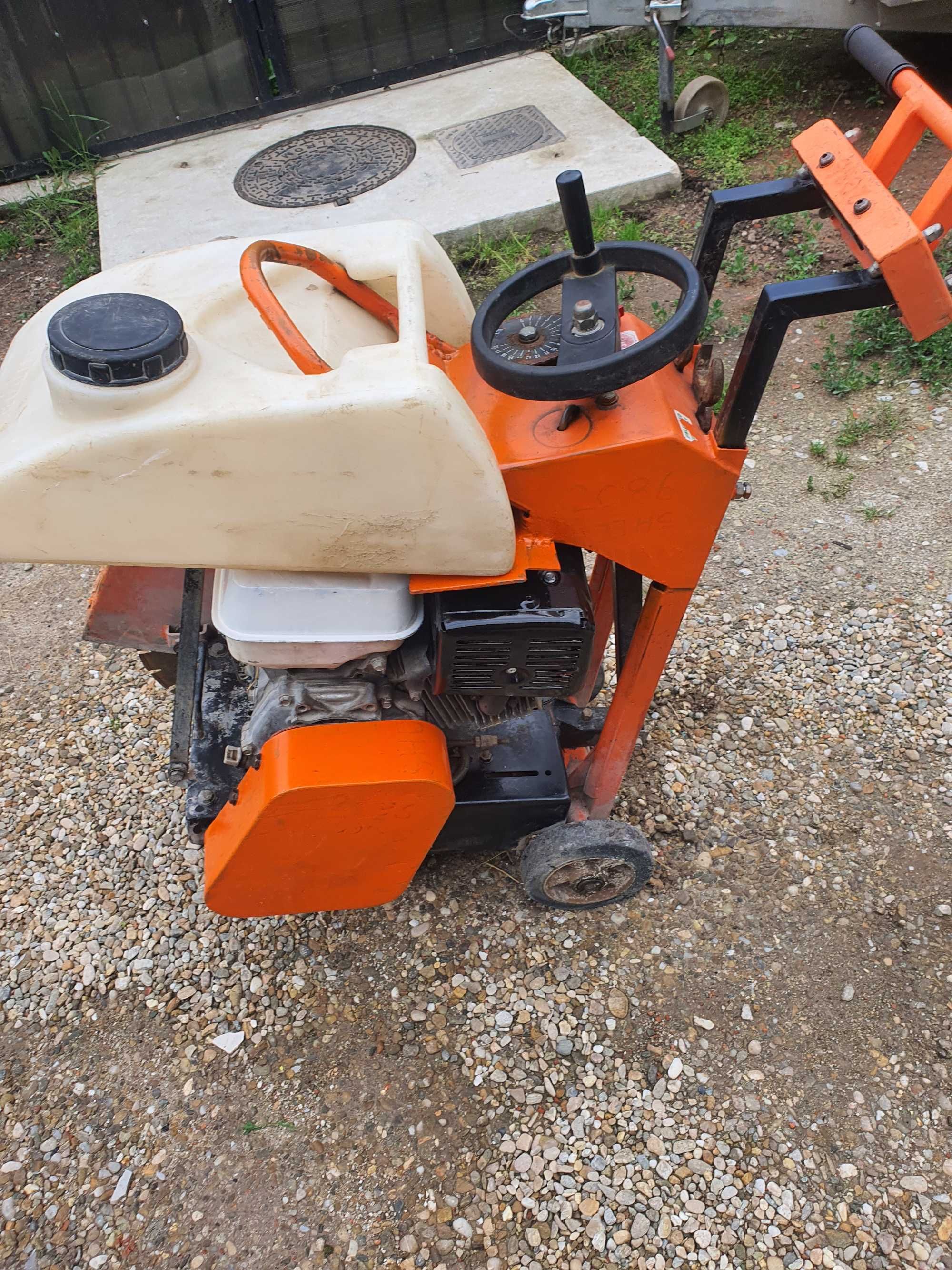 Masina de taiat beton Norton Clipper CS 451 moto Honda GX390/inchiriez