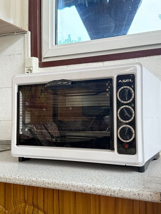 Продам электрическую печ Асель.