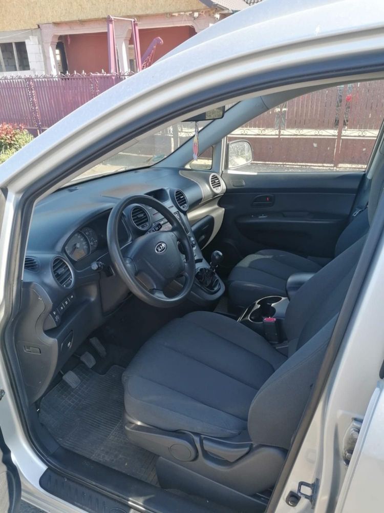 Vând kia carens