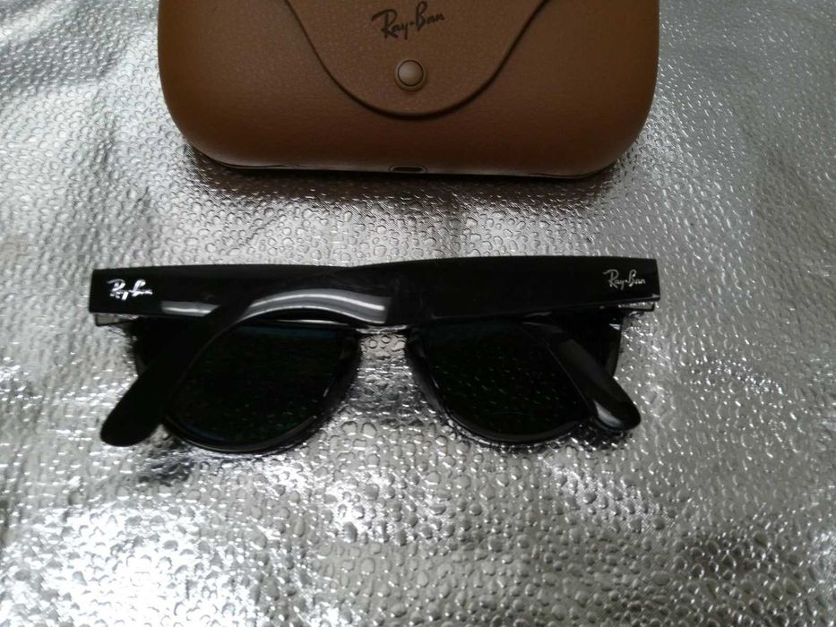 Ray-Ban Meta Headliner model. Qora yaltiroq oprava, polaroid yashil