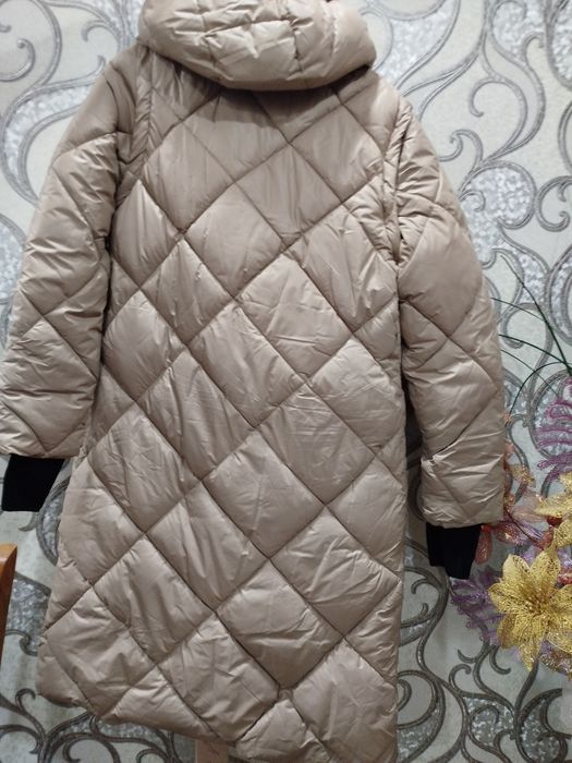 Женский пуховик.