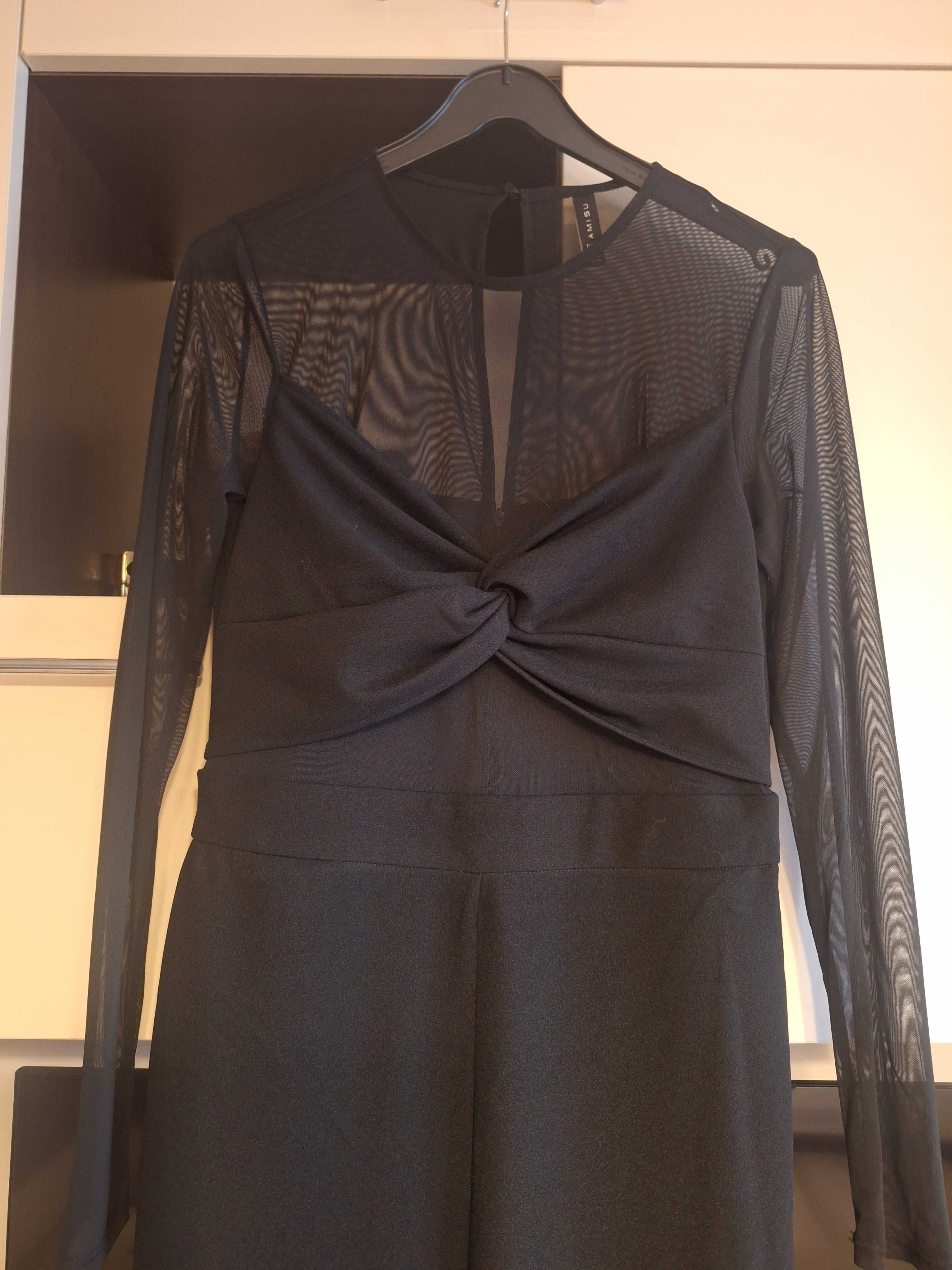 Salopeta neagra ,eleganta ,noua dar fara eticheta. Marimea 42