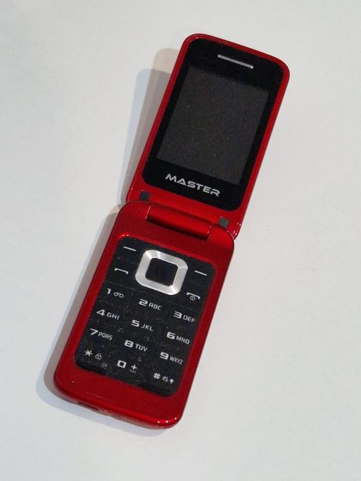 Telefon cu clapeta cu încărcător