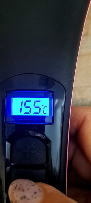 Електрическа четка за изправяне на коса.