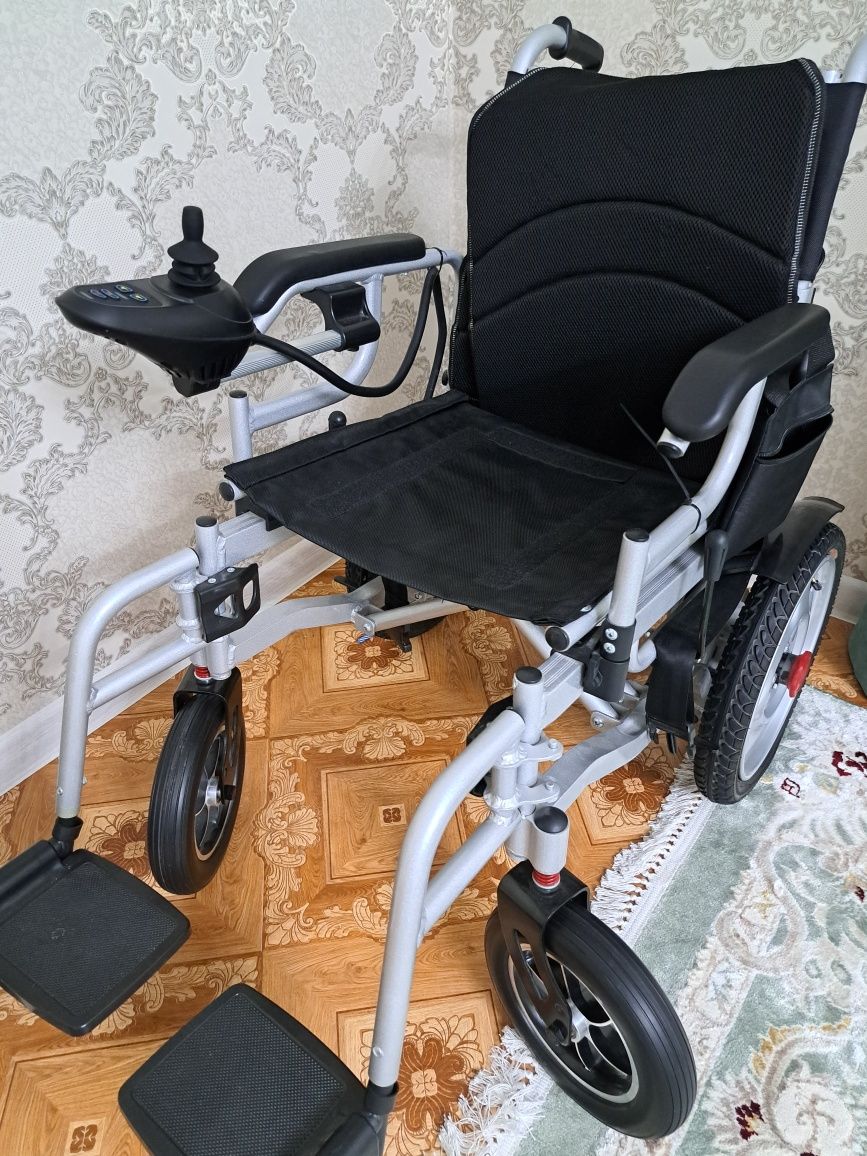 Продам инвалидную кресло с электроприводом