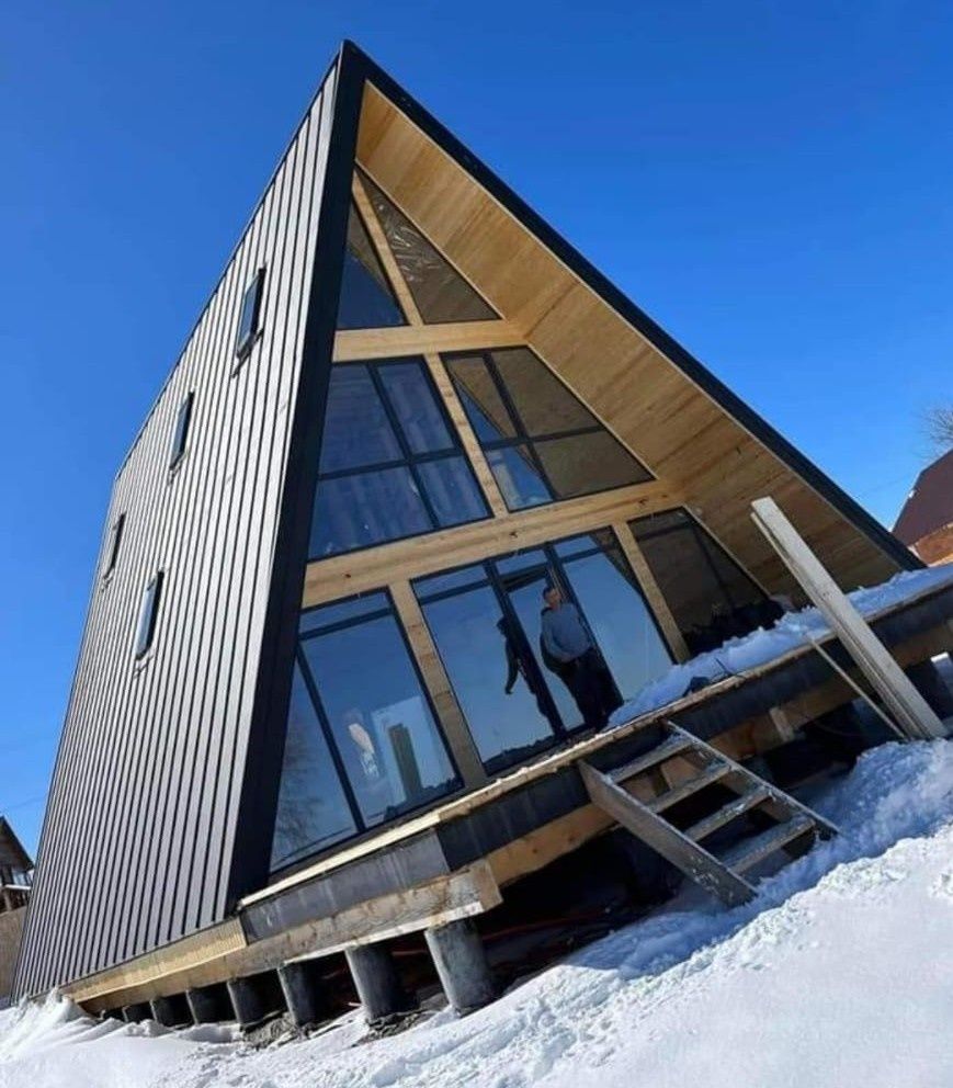 Case și cabane pe structură de lemn