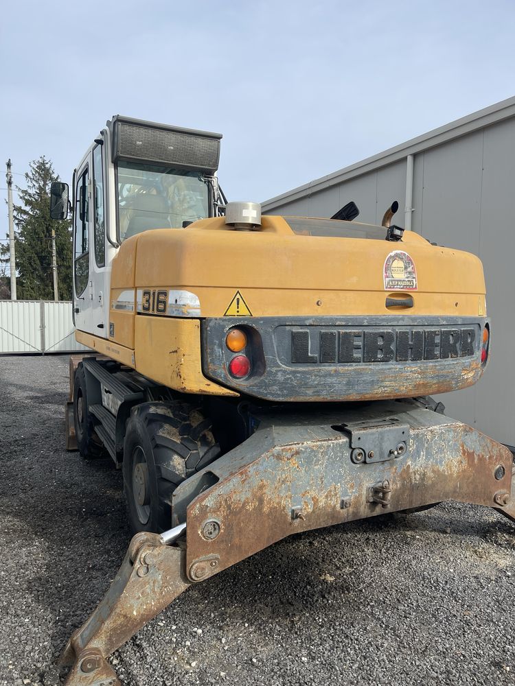 Inchirere Excavator pe pneuri Liebherr A 316