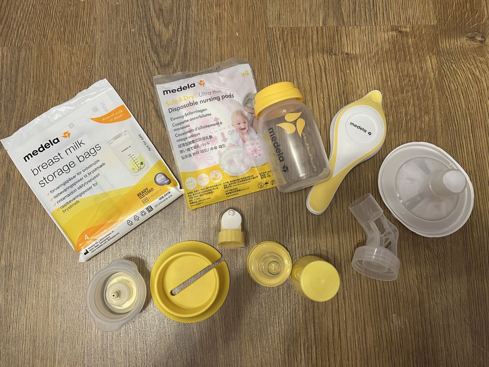Ръчна помпа Medela Harmony Essential Pack + подарък