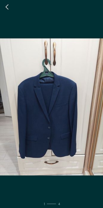 Костюм синий новый