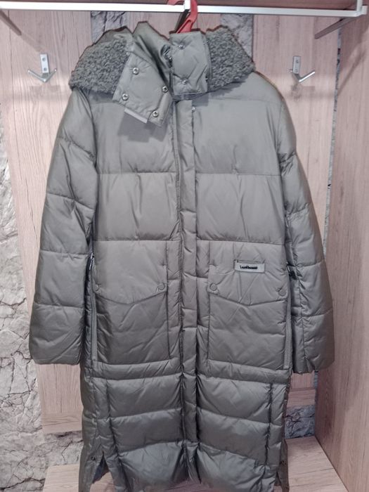 Верхняя женская одежда.