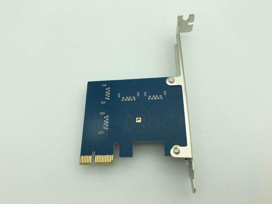 1-to-4 PCI-E extender - адаптер за увеличаване на PCI-e слот. 1-to-2