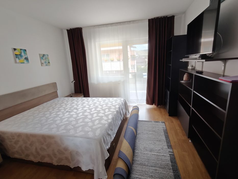 Dau in chirie apartament living open-space plus dormitor