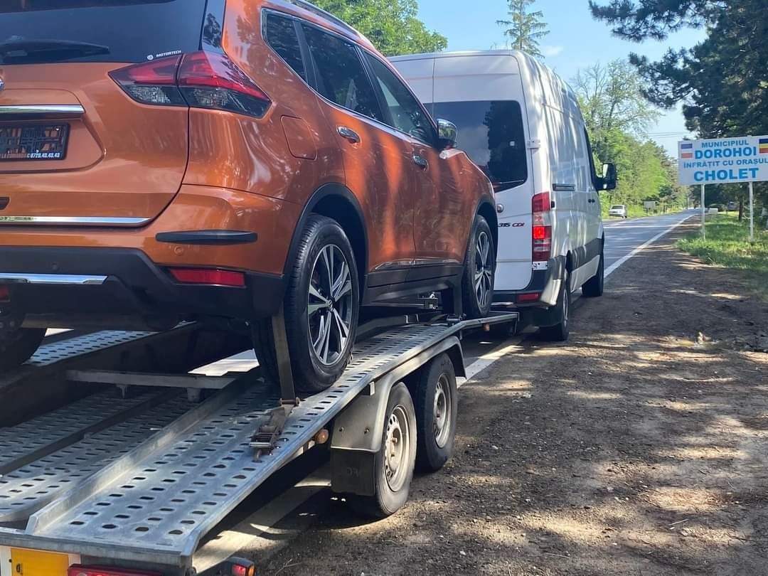 Transport utilaje și tractări auto