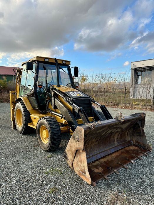 Buldoexcavator Cat 428D / An 2005 / 2 cupe