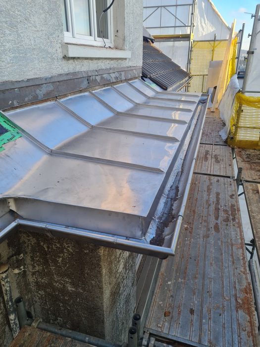 Reparatii acoperise hidroizolații terase cupru titan zinc