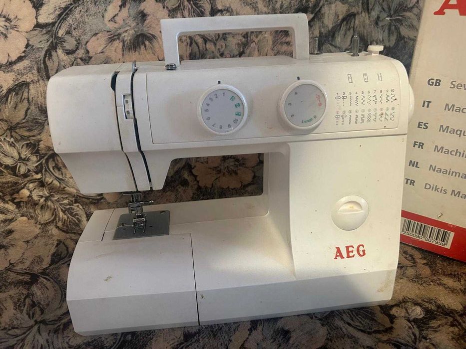Vand masina de cusut AEG 300 LEI