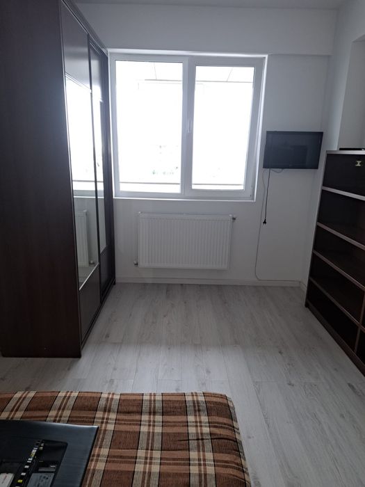 Închiriez sau vand la pretul de 70000 euro ap cu 2 camere in cartierul