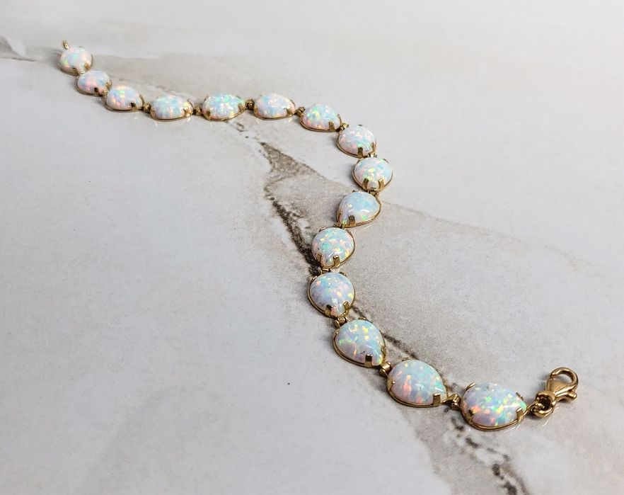 Brățară din aur de 14K cu Opal gramaj 7,02 gr