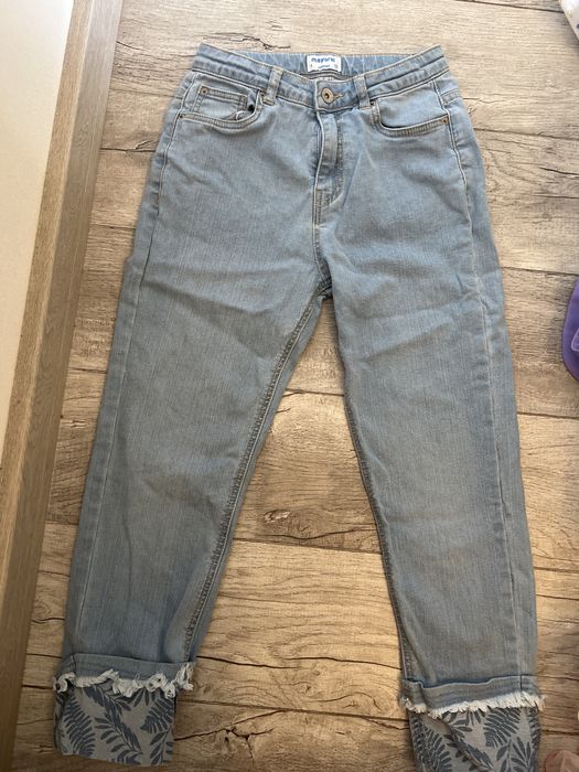 Джинсы фирменные на девочку 9-10 лет