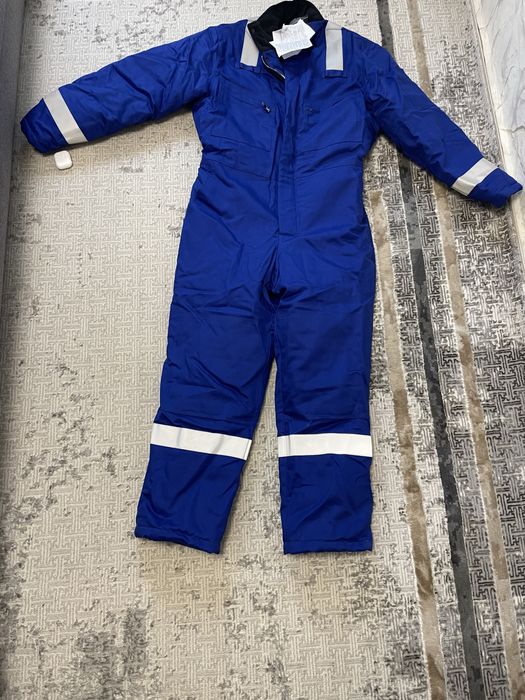 Продам новый зимний комбинезон