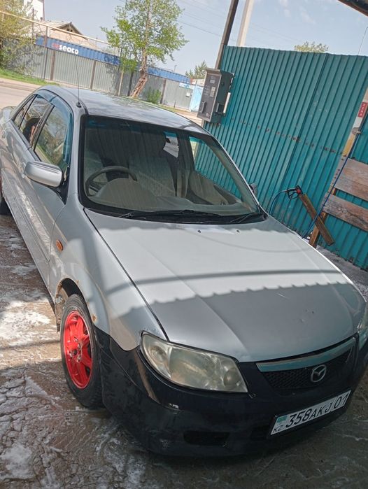 Продам по запчастям Мазда 323 family