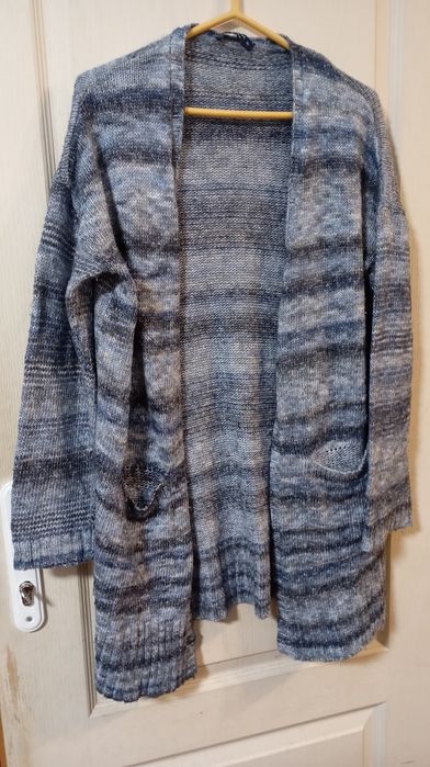 Плетена жилетка.