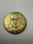 Moneda (placheta) aniversara din argint aurit.