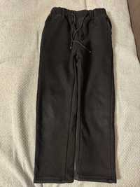 Теплые черные брюки на резинке и шнуровке на 7-9 лет