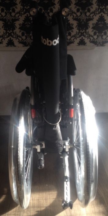 Германская инвалидная кресло-коляска фирма"Ottobock"с откидной спинкой
