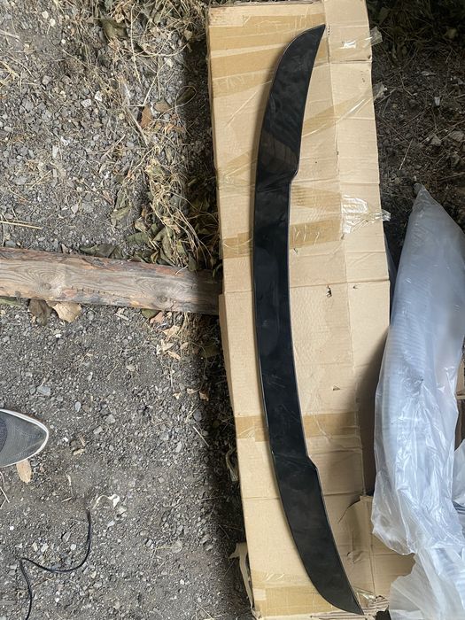 Продам новый спойлер на Kia K5.