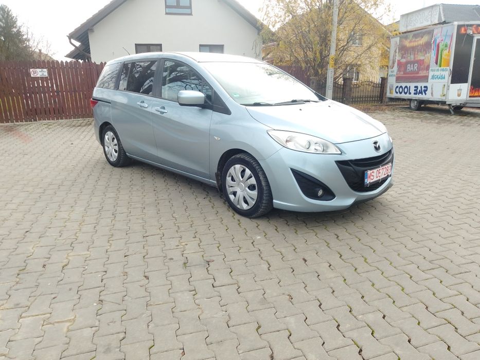 Mazda 5 cu 7 locuri motor 1.6 dízel euro 5 ne rosu valabil 3 luni