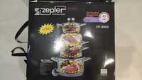Комплект тенджери с тиган по патент на Zepter