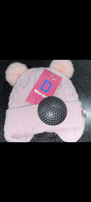 Шапочкана девочку на выписку зима